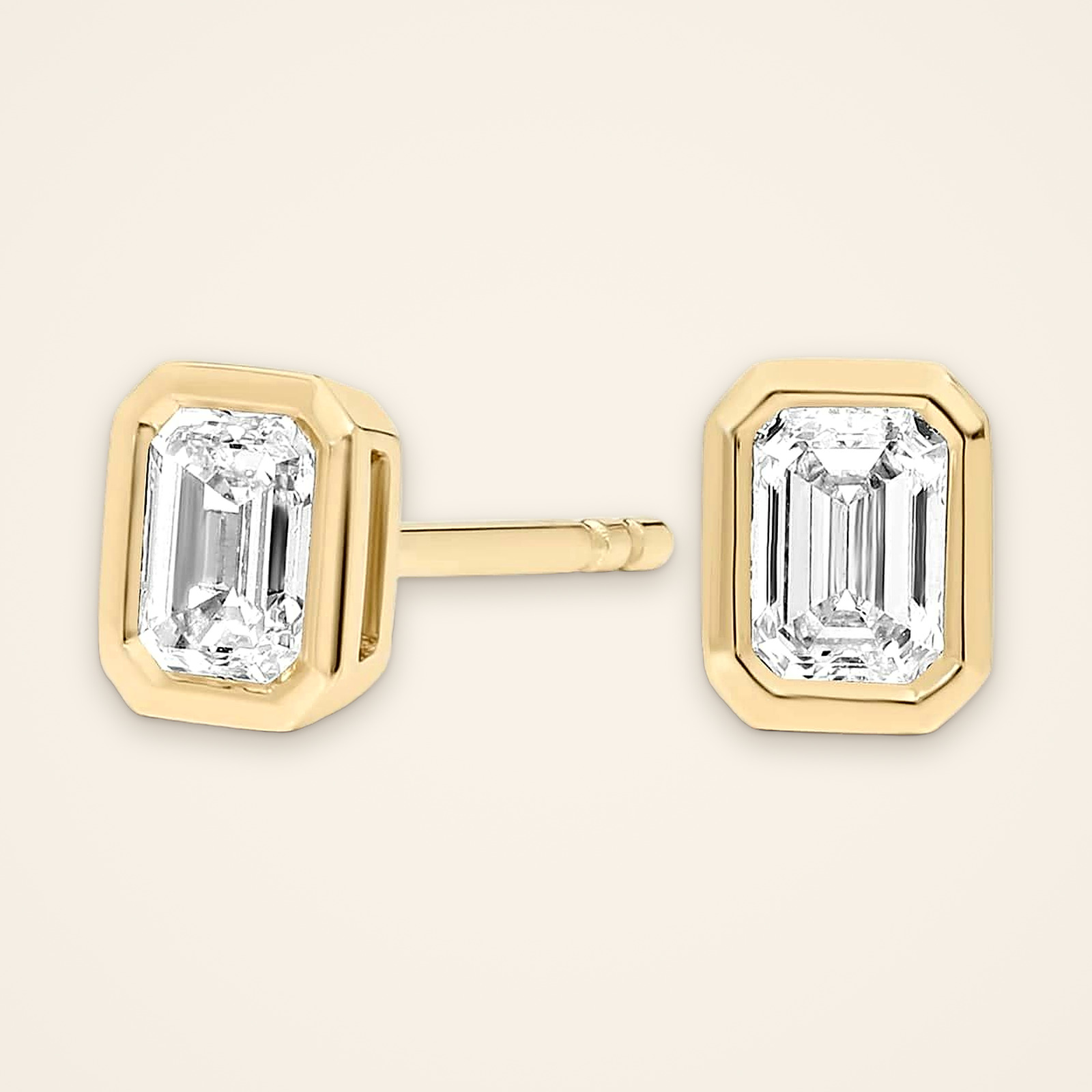 classic-bezel-set-emerald-cut-diamond-stud-earrings-1 Classic Bezel-Set Emerald-Cut Diamond Stud Earrings - Traditions