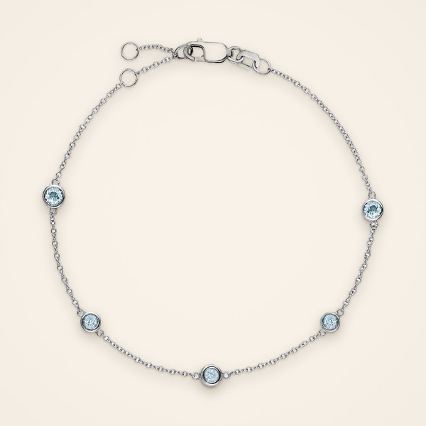 Everyday Bezel-Set Aquamarine Chain Bracelet: small bezel-set aquamarines spaced along a fine 14K gold chain - Traditions by Pooja Backliwal