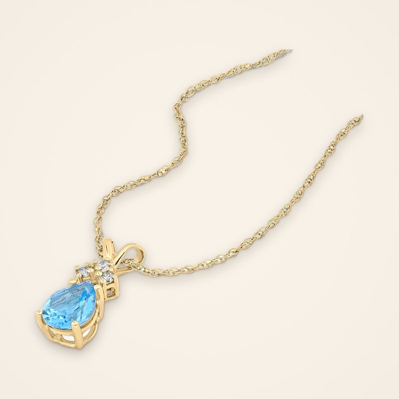 Everyday Blue Topaz Teardrop Gold Pendant - Traditions